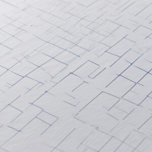 A close-up shot of a printer nozzle check pattern on paper, with some sections showing clear, unbroken lines and other sections showing faint or missing lines, highlighting the problem before cleaning.